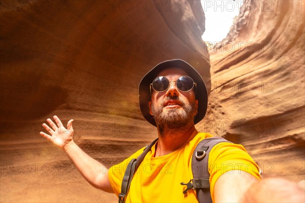 Selfie of a tourist enjoying in the limestone canyon Barranco de las Vacas in Gran Canaria, Canary