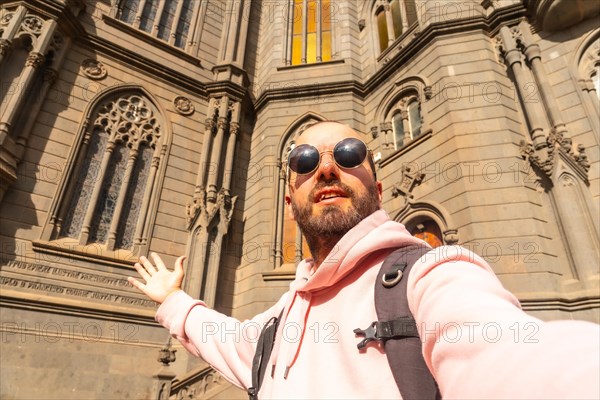 Selfie of a tourist visiting the Church of San Juan Bautista, Arucas Cathedral, Gran Canaria,