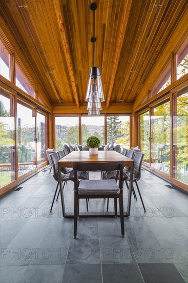 Four season gazebo and industrial style black with clear glass pendant lighting fixtures over wood