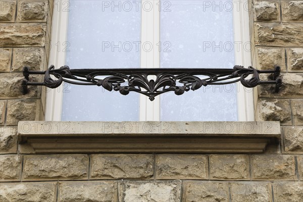 Window railings and balconies on residential buildings designed by Hector Guimard in the Art