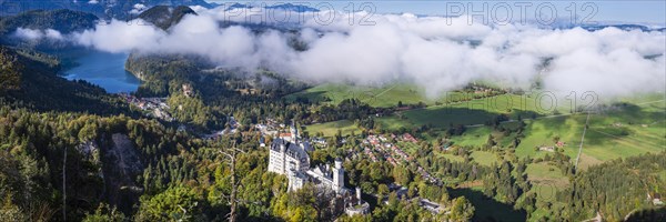 Neuschwanstein Castle and the Alpsee, near Hohenschwangau, Romantic Road, Ostallgaeu, Bavaria,