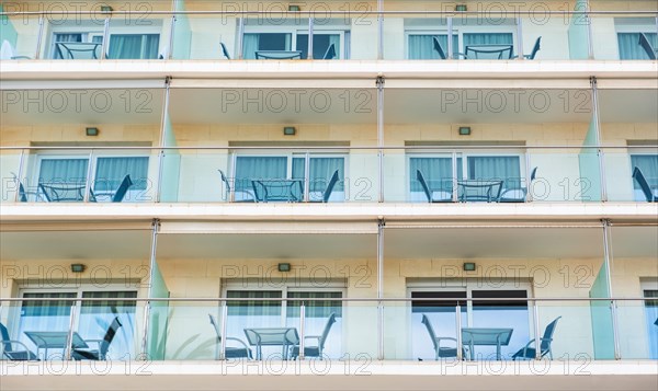 Balconies of a hotel on the seafront promenade in Sitges, Spain, Europe