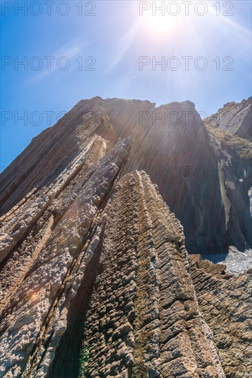 Flysch Basque Coast Geopark in Zumaia, Gipuzkoa. Layers of hard cohesive rocks interspersed with