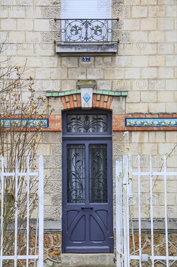 Window railings and balconies on residential buildings designed by Hector Guimard in the Art