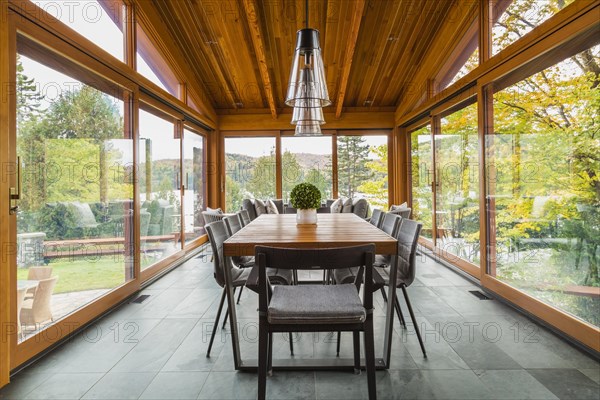 Four season gazebo and industrial style black with clear glass pendant lighting fixtures over wood