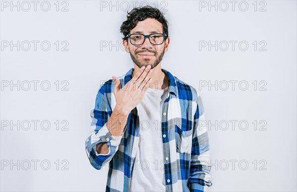 Person making THANK YOU gesture in sign language isolated. Man showing THANK YOU gesture in sign