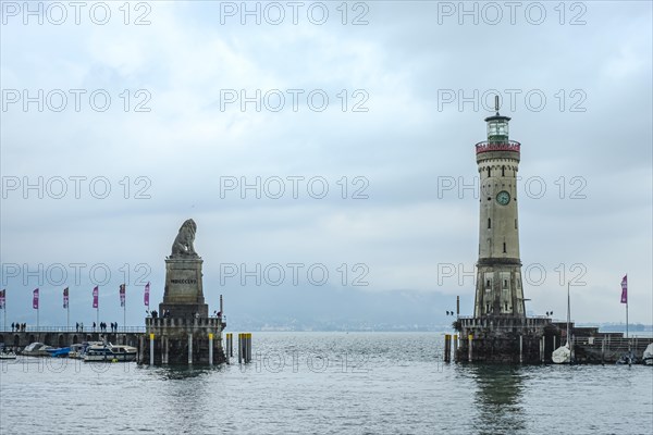 Harbour entrance with the Bavarian Lion and the lighthouse, Lindau (Lake Constance), Bavaria,