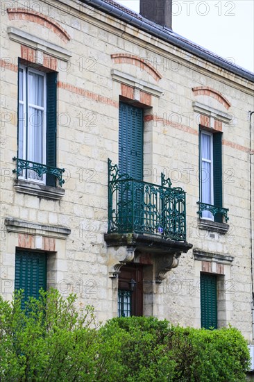 Window railings and balconies on residential buildings designed by Hector Guimard in the Art
