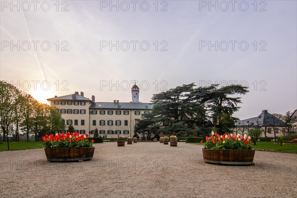 A castle with park at sunset. Historic building. Summer residence of the Prussian kings and German