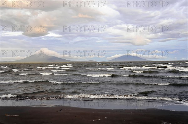 Underway near Rivas, Lake Nicaragua, Ometepe Island in the background, Nicaragua, Wave breaking on
