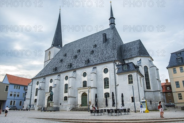 Everyday scene in front of the Herderkirche, actually the town church of St Peter and Paul, a