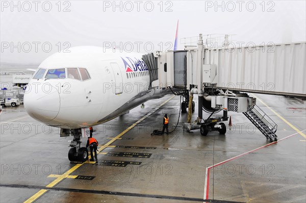AUGUSTO C. SANDINO Airport, Managua, Nicaragua, An aircraft at the gate with jet bridge extended