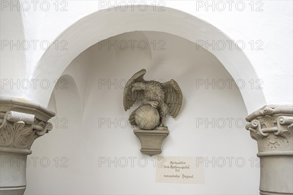 Restored original of the sculpture of the imperial eagle from 1721 from the town hall gable of the