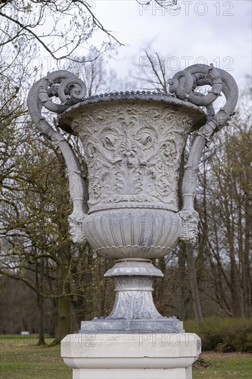 Cast zinc vase on a pedestal in the castle park, Ludwigslust, Mecklenburg-Vorpommern, Germany,
