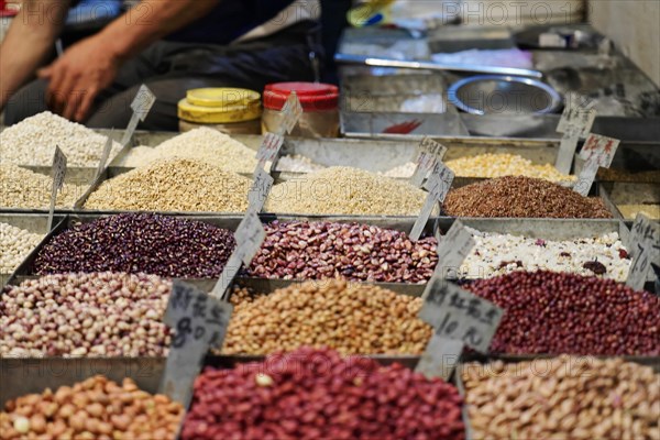Chongqing, Chongqing Province, China, Different kinds of pulses at a market, displayed with price