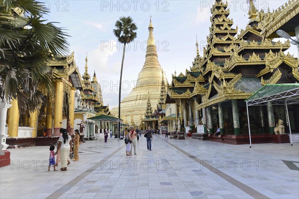Shwedagon Pagoda, Yangon, Myanmar, Asia, Group of people and tourists in front of an imposing