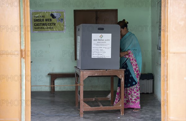 A women casts her vote during the first phase of the India's general elections on April 19, 2024 in