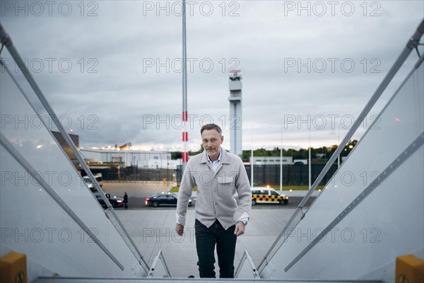 Christian Lindner (FDP), Federal Minister of Finance, pictured boarding an aircraft of the