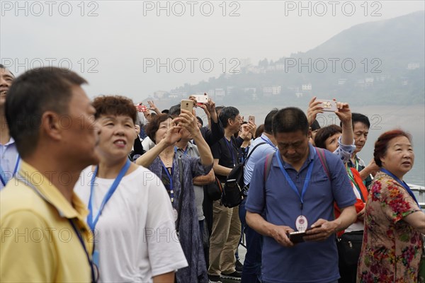 Cruise ship on the Yangtze River, Yichang, Hubei Province, China, Asia, A group of tourists taking