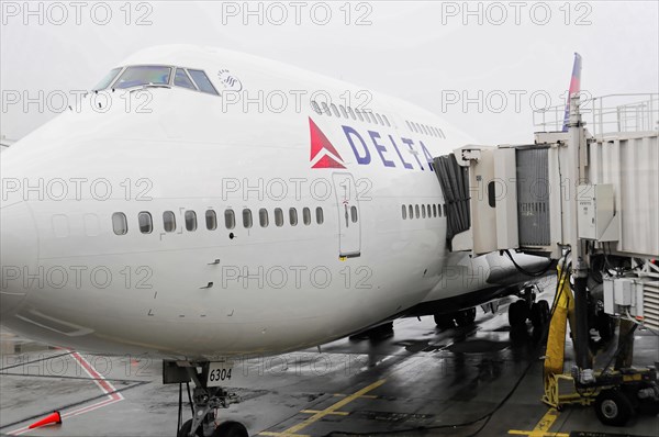 AUGUSTO C. SANDINO Airport, Managua, Nicaragua, A Delta aircraft at the gate connected to a