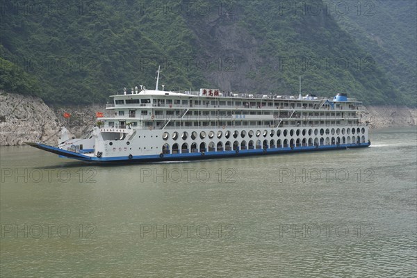 Chongqing, Chongqing Province, Cruise ship on the Yangtze River, A multi-storey cruise ship glides