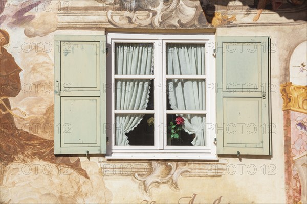 Lueftlmalerei on old house facade with wooden window, Jocherhaus, district Garmisch,