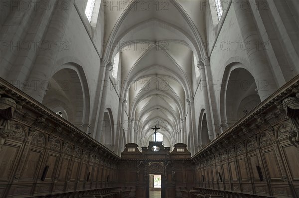Oak choir stalls, 17th century, and ribbed vault in the former Cistercian monastery of Pontigny,