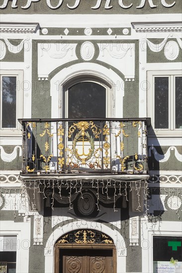 Old, decorated balcony at the old pharmacy on Marienplatz, district of Garmisch,