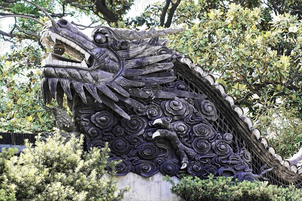 Excursion to the Zhujiajiao water village, Shanghai, China, Asia, An artistic dragon sculpture in