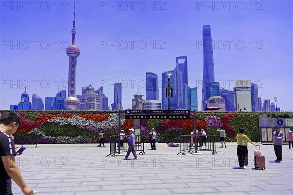 View from the Bund to the skyline at the Huangpu River with Oriental Pearl Tower, World Financial