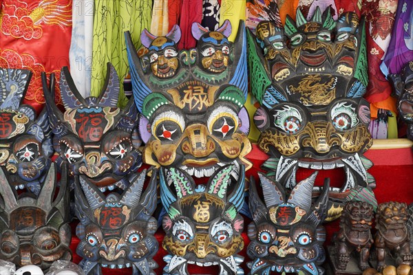 Chongqing, Chongqing Province, souvenirs, stall, on the Yangtze River, masks with elaborate