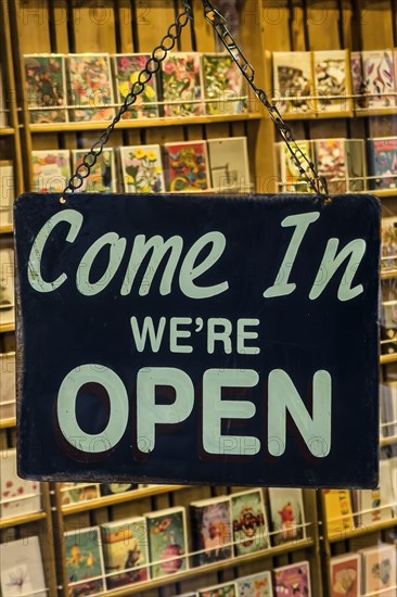 Sign with the inscription, open, shop door, English, international, open, opening hours, European,