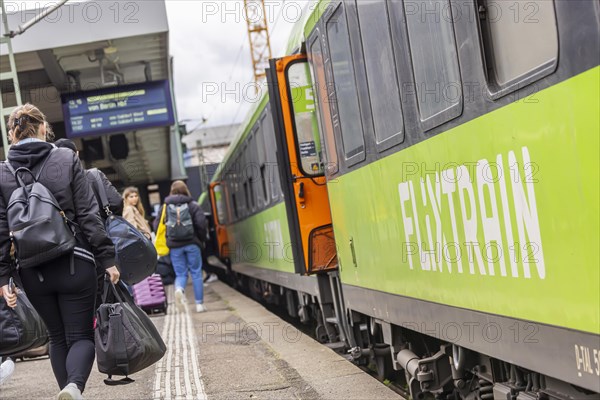 Flixtrain train at Stuttgart main station, track apron with arriving and departing trains,