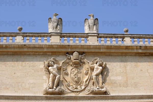 Coat of arms of Pope Paul V on the facade, Hotel des Monnaies, Avignon, Vaucluse,