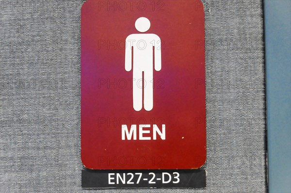 AUGUSTO C. SANDINO Airport, Managua, Nicaragua, Red sign for the men's toilet with symbol and