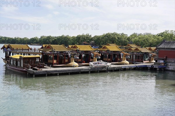 New Summer Palace, Beijing, China, Asia, Chinese ship on the shore of a lake under a clear blue