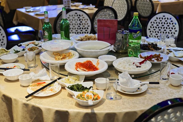 Dinner in a posh restaurant in Shanghai, China, Asia, A meal is over, leftovers and used crockery