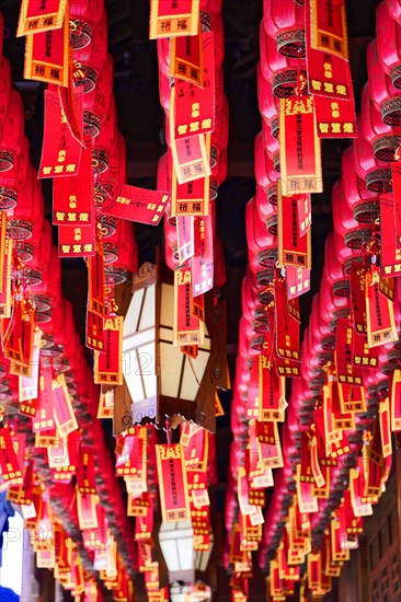 Jade Buddha Temple, Shanghai, ceiling full of red Chinese lanterns in traditional arrangement,