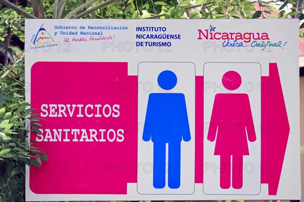 Granada, Nicaragua, A colourful sign marks toilets with blue and pink gender symbols, Central