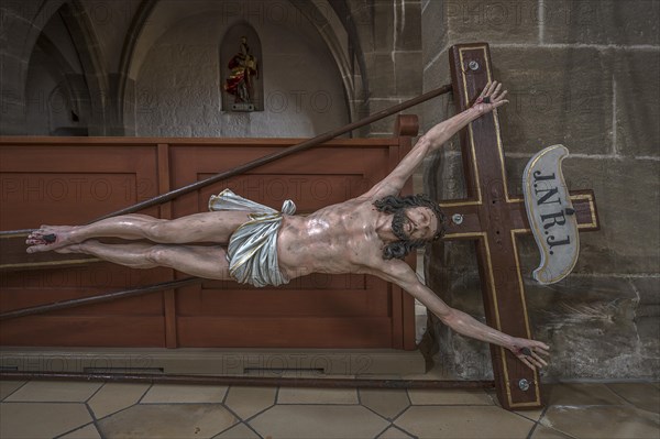 Life-size, carved figure of Jesus on the cross, 350-year-old processional figure in St Michael's
