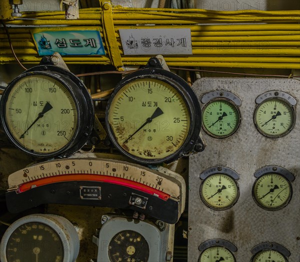 Closeup of gauges and electrical wiring on board submarine on display at Unification Park in