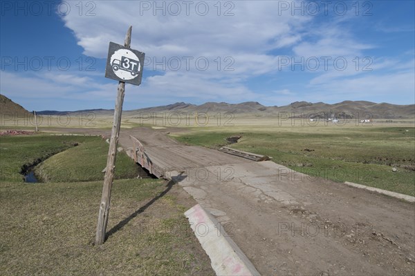 Simple bridge over a watercourse in the grassland on the way to Amarbayasgalant Monastery, Selenge