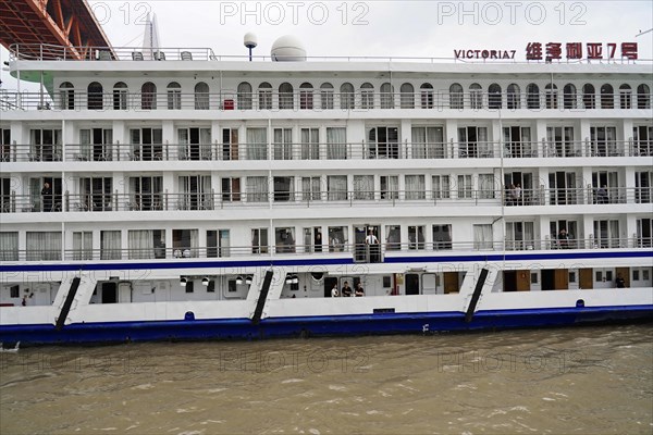 Chongqing, Chongqing Province, China, Close-up of a ship window area with reflective surfaces on