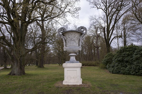 Cast zinc vase on a pedestal in the castle park, Ludwigslust, Mecklenburg-Vorpommern, Germany,