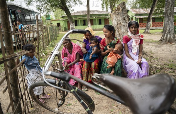 BOKAKHAT, INDIA, APRIL 19: Voters wait at a polling station to cast their votes during the first