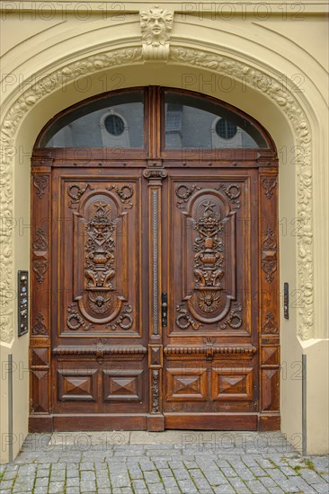 Richly decorated historic front door from 1902 at Herderplatz No. 3 in the old town centre of