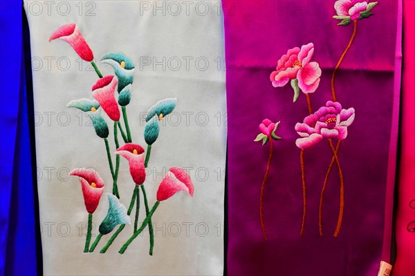 Silk factory Shanghai, close-up of traditionally embroidered flowers on fabric, Shanghai, China,