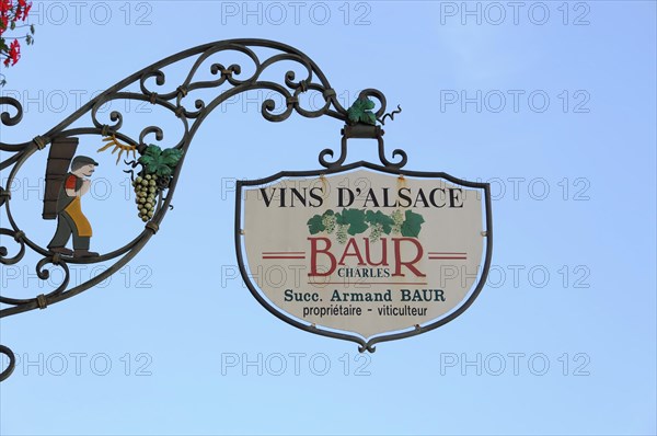 Eguisheim, Alsace, France, Europe, A metal wine sign with the inscription 'VINS D'ALSACE BAUR' in