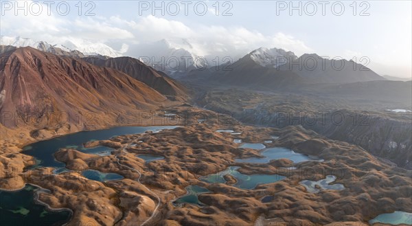Atmospheric aerial view, high mountain landscape with glacier moraines and mountain lakes, behind