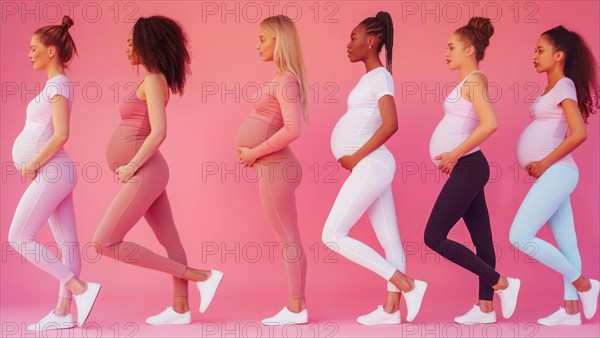 A group of pregnant women are standing in a line, with each woman wearing a different colored